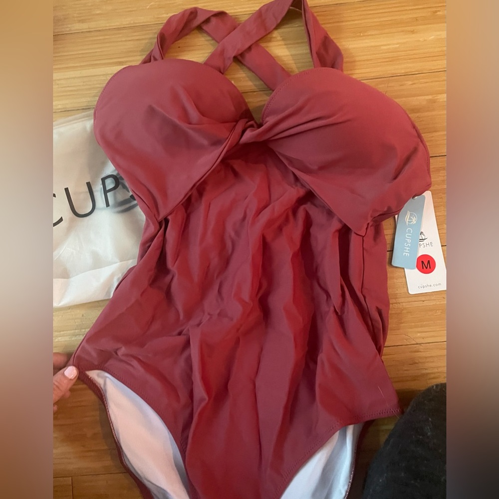 NWT.  Brand new Cupshe one-piece bathing suit. Size Medium. Coral.